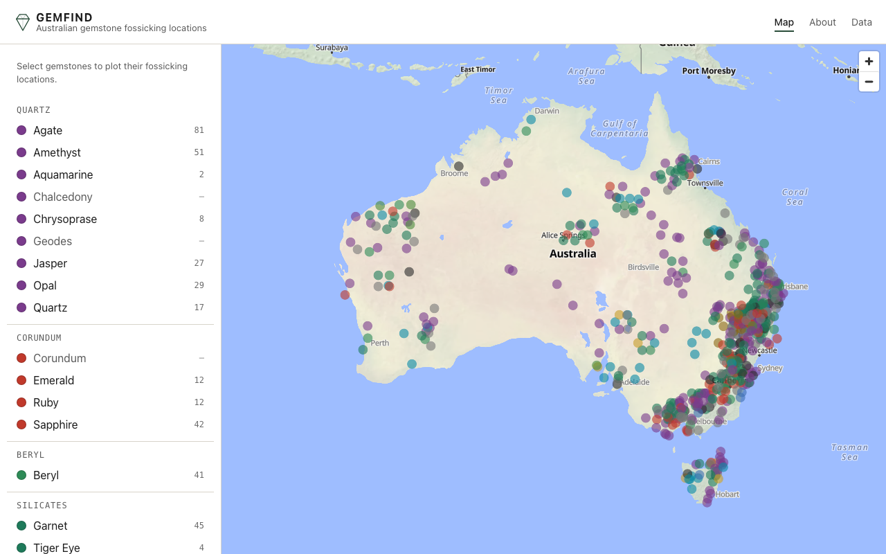 The 2026 Gemfind web app: a GEMFIND wordmark, a left sidebar listing gemstones grouped by family with counts, and a modern basemap of Australia with colourful clustered markers.